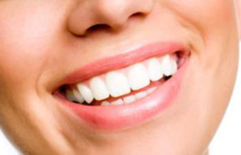 beautiful smile with perfect teeth after cosmetic procedures