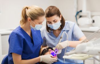 child patient undergoing dental procedures