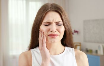 Woman With Jaw Pain